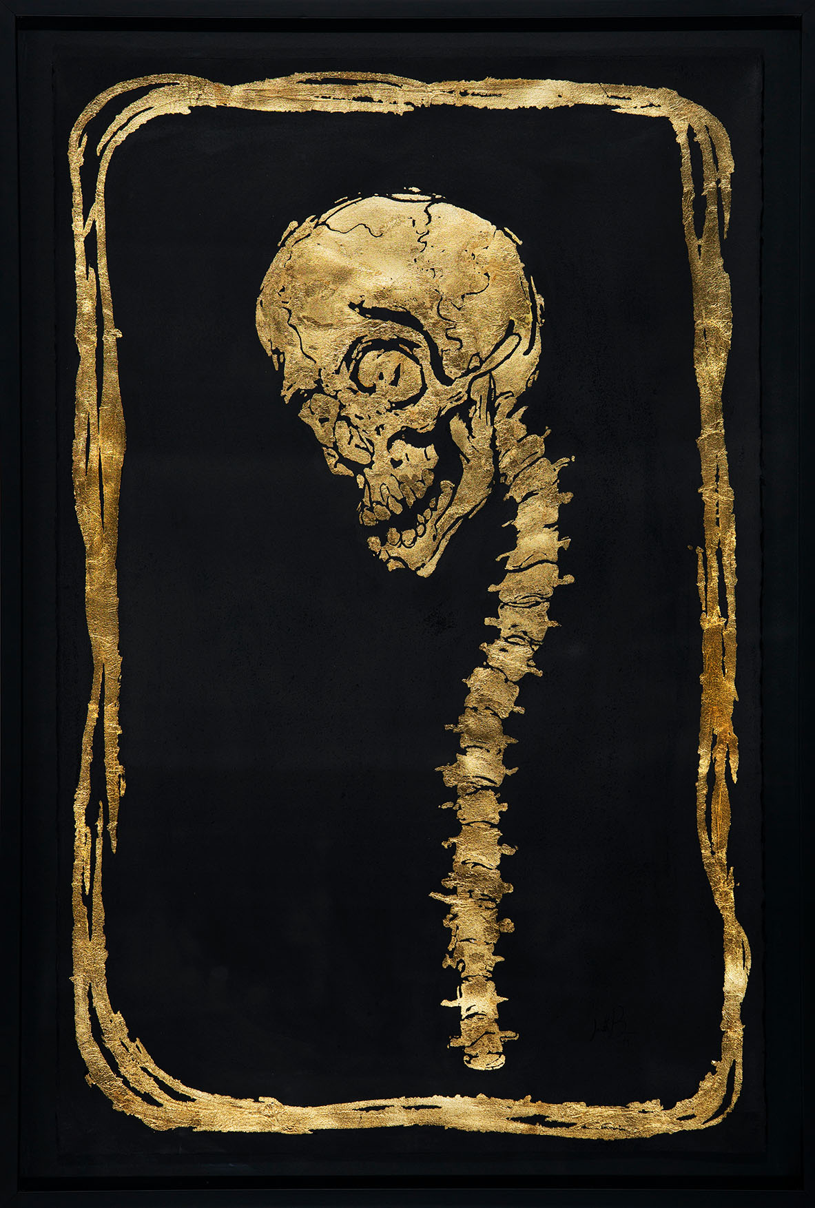 Golden skull with spine on a black background with a golden frame.